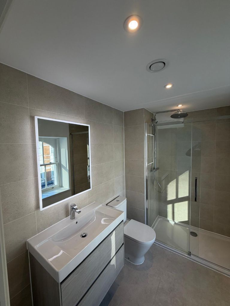 Modern bathroom with professional recessed lighting
